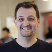 Photograph of man smiling